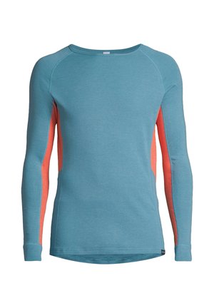 Blue long-sleeve shirt made of soft material, featuring coral accents along the sides and a rounded neckline. Smooth texture with fitted design.
