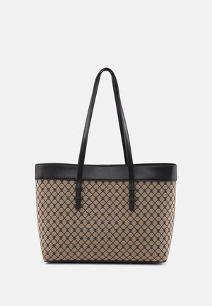 Sac cabas à motif beige et noir avec de longues poignées noires et une bordure noire le long du bord supérieur.