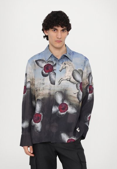 Lightweight, multicolored shirt featuring floral patterns with red centers and a white unicorn graphic, in a relaxed fit with a collar.