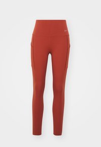 Czerwone legginsy sportowe z wysokim stanem, wykonane z elastycznego materiału, z bocznymi kieszeniami i małym logo.