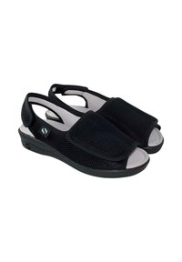 Sandalias ortopédicas negras de punta abierta con correas ajustables de malla y plantillas blancas acolchadas, diseñadas para la comodidad y el soporte.