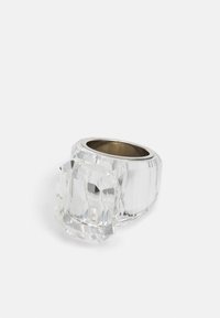Clear crystal ring featuring a chunky, faceted design with a smooth silver band. The large square stone is set prominently at an angle.