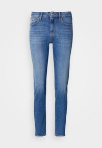 Blugi din denim de culoare albastru deschis, cu croială slim, design cu cinci buzunare, închidere cu nasture și ușoară decolorare. Detalii cusute pe margini.