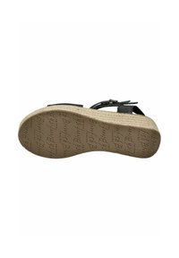 Black strappy sandal with a woven espadrille sole. Textured synthetic upper with a smooth finish. Visible brand logo on the sole.