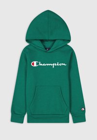 Felpa con cappuccio verde realizzata in morbido materiale, caratterizzata da una tasca frontale e dal logo "Champion" bianco sul petto. I polsini presentano finiture a costine.