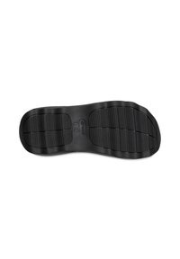 Semelle de chaussure Crocs en caoutchouc noir avec motif de bande de roulement texturé et nom de la marque centré sur la zone de la voûte plantaire de la semelle.