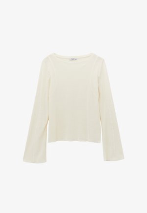 Langærmet top i blødt, cremefarvet stof. Har en rund halsudskæring og let udsving i ærmerne, med synede detaljer på siderne.