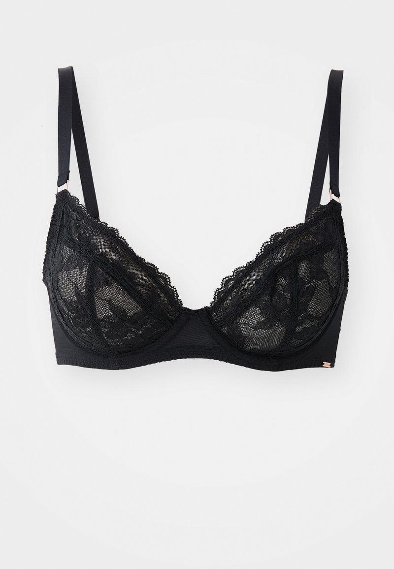 Black lace bra featuring floral patterns, underwire support, adjustable straps, and a smooth back band with a small metallic accent.