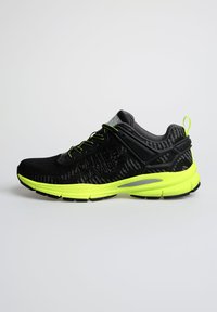 Black athletic shoe with a textured upper, featuring bright yellow accents, reflective details, and a cushioned sole.