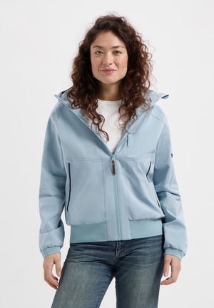 Lichtblauwe ritsjack met een capuchon, elastische manchetten en een elastische onderrand. Voorzien van zwarte ritsaccenten en gemaakt van een soepel, waterafstotend materiaal.