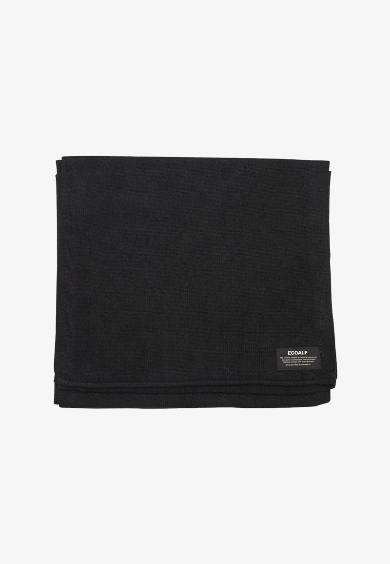 Couverture noire Ecoalf pliée avec un tissu texturé et une petite étiquette de marque tissée dans un coin.
