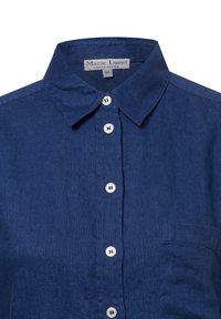 Dark blue linen shirt featuring a button-down collar, front placket with white buttons, and a single chest pocket.