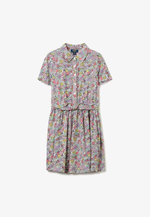 Robe à manches courtes boutonnée avec ceinture à nouer, arborant un motif coloré de fleurs et de cœurs avec des mots tels que « amour » et « bonjour ».