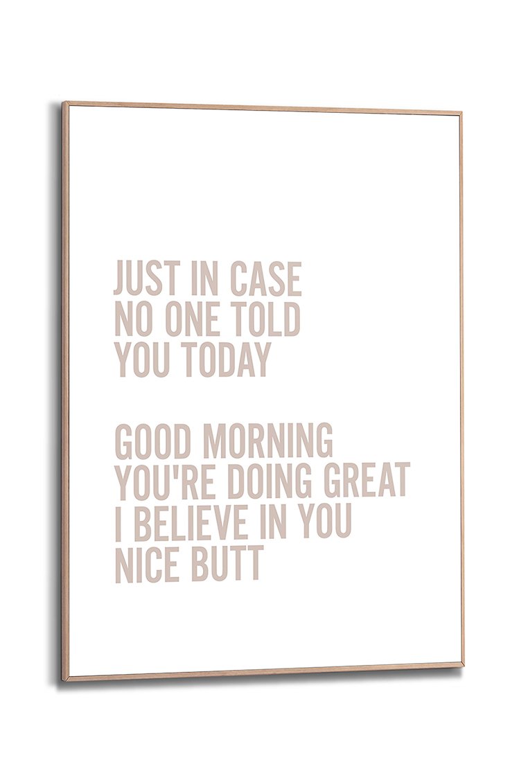 Eingekapselter beige Text auf weißem Hintergrund: "Falls dir heute noch niemand gesagt hat: Guten Morgen, du machst das großartig, ich glaube an dich, schöner Hintern."