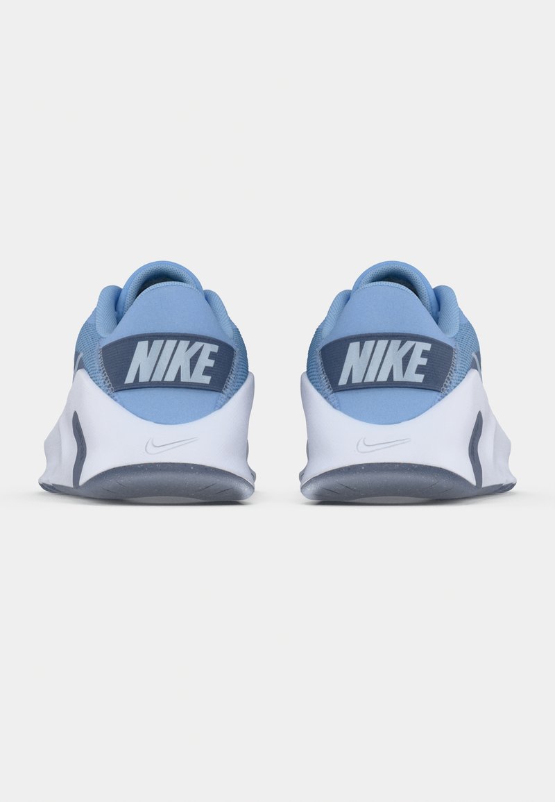 Zapatillas Nike azules con empeine de malla, detalles oscuros en contraste, cuello acolchado y suela blanca con parte inferior gris texturizada.