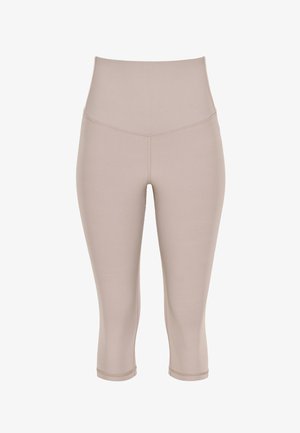 Beige højtaljede, cropped tætsiddende leggings med flade sømme, designet til atletisk eller afslappet brug.
