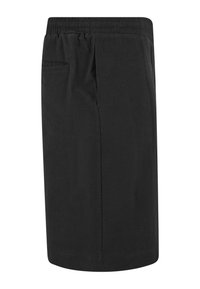 Jupe noire longueur genou avec une taille élastique et une petite poche sur le côté droit.