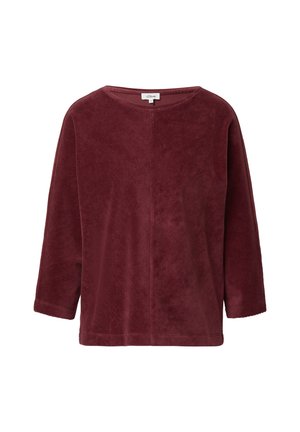 Burgundy long-sleeve corduroy blouse with round neckline and relaxed fit, featuring a subtle vertical seam down the front center.