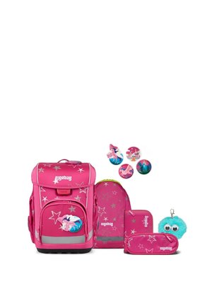 Bright pink school backpack set with star patterns, matching pencil case, wallet, blue fuzzy keychain, and four round unicorn-themed badges.