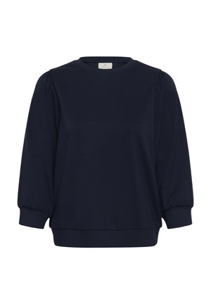 Blouse bleu marine à manches longues avec encolure ronde, épaules bouffantes et poignets ajustés.