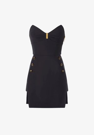Mini abito nero senza spalline con scollatura a cuore, chiusura centrale dorata e due file di bottoni decorativi dorati sulla gonna.