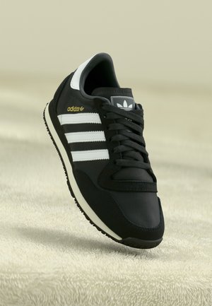 adidas Originals GALAXY OG UNISEX - Sneakers basse - carbon/footwear white/core black