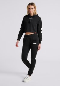 Hummel LEGACY TAPERED  - Træningsbukser - black