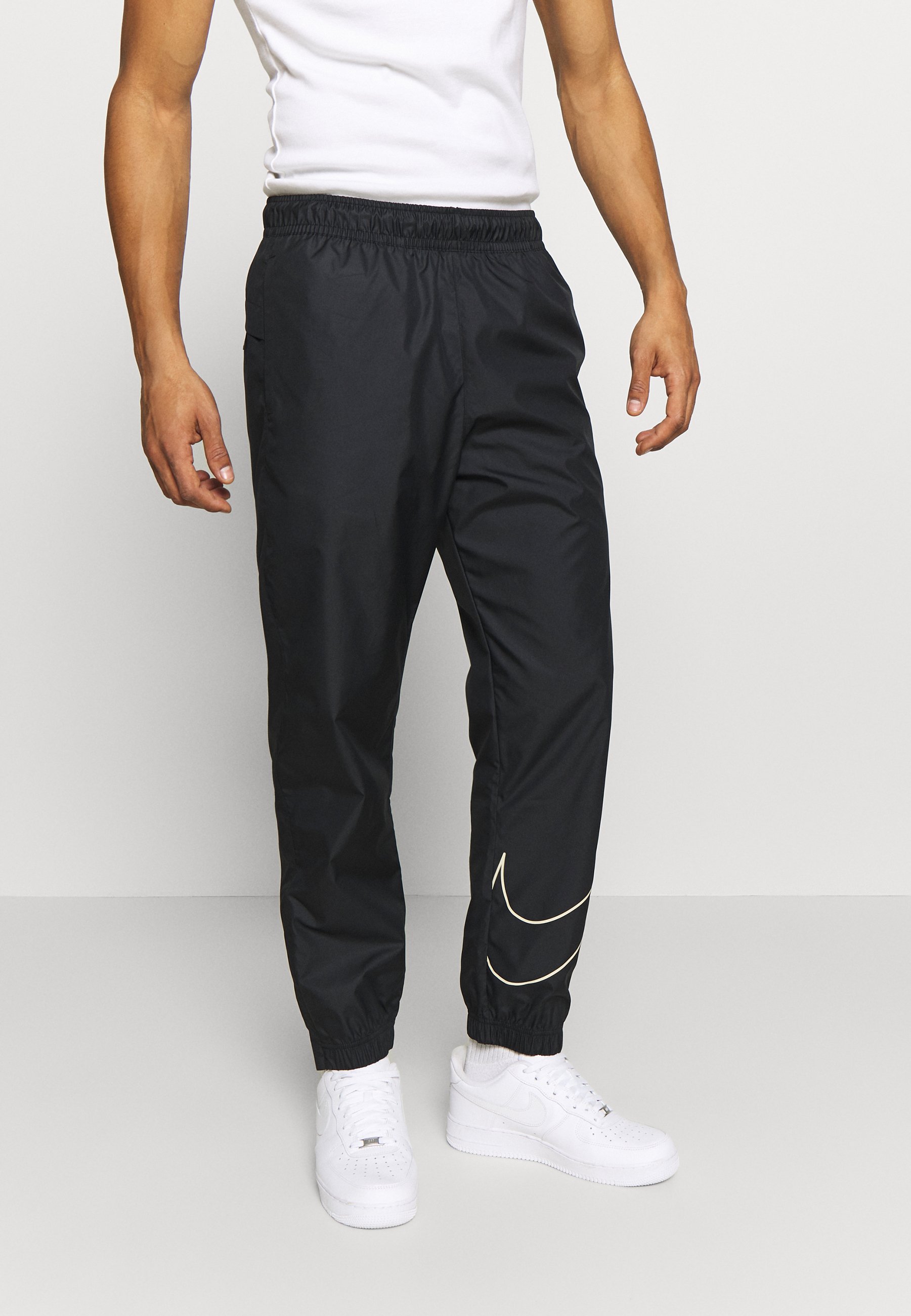 nike black and white track pants