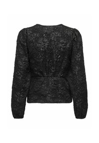 Blouse en dentelle noire à motif floral, manches longues et taille ajustée. Tissu texturé avec un léger éclat. Encolure ronde et détails froncés.