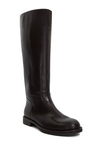 Brown leather knee-high boot with a smooth finish, rounded toe, and a minimalistic design. Sturdy sole with a low heel.