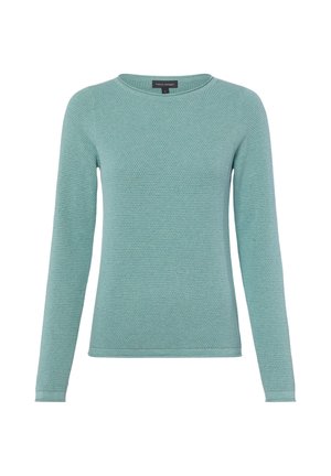 Pull à manches longues bleu clair texturé avec encolure ronde et coupe près du corps.
