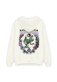 Krémová mikina s kapucí s barevným grafickým designem žáby obklopené květinami, hvězdami a textem "DREAMLAND" v stylizované typografii.