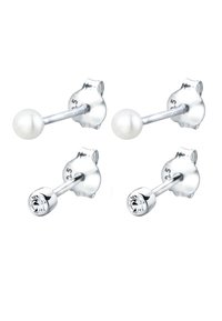 Pendientes de botón de plata de ley que presentan dos diseños: uno con una perla blanca lisa y otro con una piedra de rhinestone clara, cada uno con un poste recto.