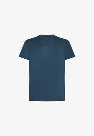 Marineblå performance T-shirt med korte ærmer, letvægtsstof og subtil tekstur, med et lille logo på fronten.