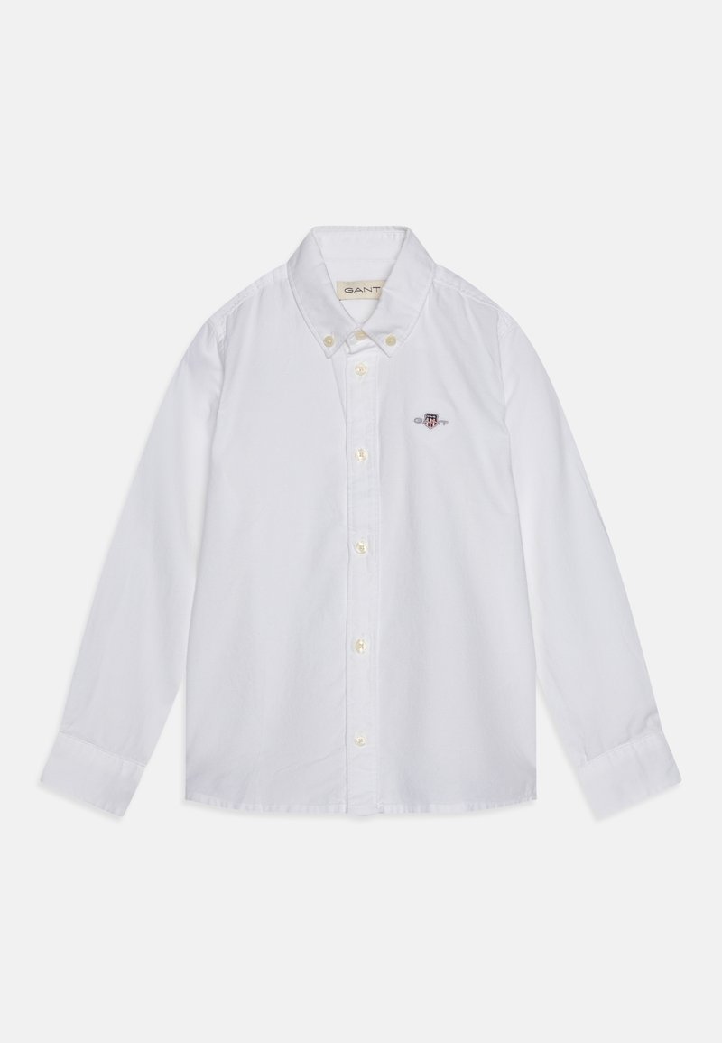 Chemise blanche à manches longues avec boutons, col boutonné et petit logo brodé sur la poitrine gauche.