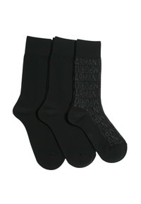 Tre par sorte sokker lavet af et glat stof. Et par har et subtilt gentaget logo mønster, mens de andre er ensfarvet sorte.