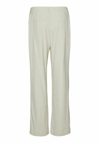 Lichtbeige wijde broek van ribbelstof, met een platte tailleband, twee achterzakken en een op maat gemaakte, ontspannen pasvorm.
