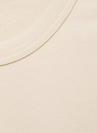 Beige cotton fabric with a textured finish, featuring a ribbed crew neckline. The material appears soft and is slightly stretchy.