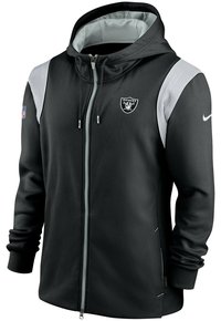 Sudadera con cremallera negra hecha de un tejido suave, con capucha forrada en gris, acentos de franjas blancas en los hombros y el logo de los Raiders en el pecho.