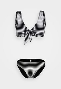 Striped black and white bikini set with a knotted top and ruched straps. Bottom features matching stripes and a textured edge.
