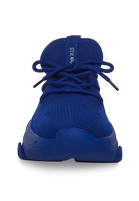 Blue athletic shoes with a textured mesh upper, round toe, and flat laces. Features a padded tongue and logo tag on the tongue.