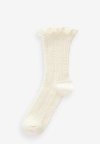 Knielanger, cremefarbener Socken mit gerippter Textur und blumigen Spitzenbesatz am Bündchen. Hergestellt aus weichem, elastischem Material.