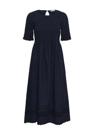 Tumesinist keskmise pikkusega kleit lühikeste padjavarrukatega, kroogitud ülakeha, avausega seljapool ja silmapaistva pitsäärega põhi.