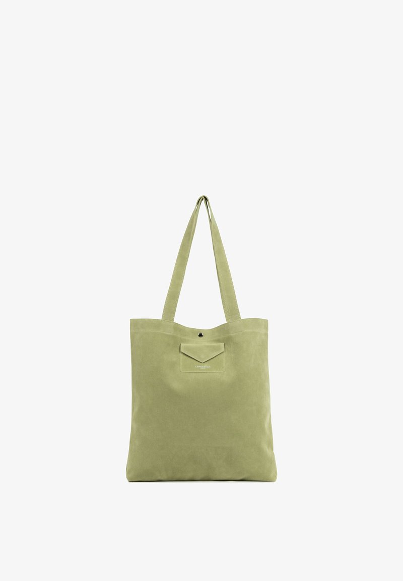 Sac cabas en daim vert clair avec longues anses et petite poche avant avec fermeture à pression.