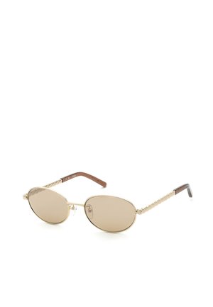 Lunettes de soleil avec verres ovales teintés marron, monture métallique dorée et branches dorées texturées avec embouts incurvés marron foncé.