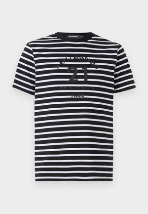 Schwarz-weiß gestreiftes T-Shirt mit Rundhalsausschnitt. Enthält erhabenen Text "21 RUE ST-GUILLAUME PARIS" und Logo. Aus weichem Baumwollmaterial.