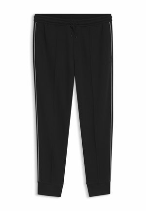 Pantalon de jogging noir avec taille élastique, cordon de serrage, poches latérales, poignets côtelés et fines bordures blanches le long des coutures extérieures.