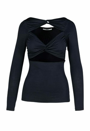 Long-sleeve top in dark navy, featuring a twisted front design, soft fabric, and a fitted silhouette with cutout detailing.