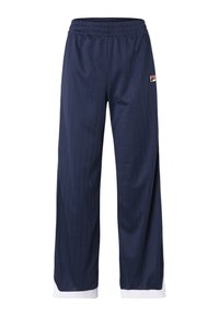 Pantaloni a gamba larga blu navy con strisce verticali, elastico in vita, polsini bianchi e un piccolo logo rosso, bianco e nero sulla parte superiore della gamba sinistra.