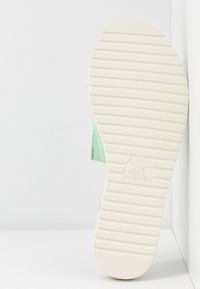 Sorel Platt slip-in - mint